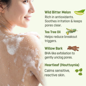 Woman using ABERA Folliculitis Shower Gel with wild bitter melon, tea tree oil, willow bark and heartleaf ingredients.